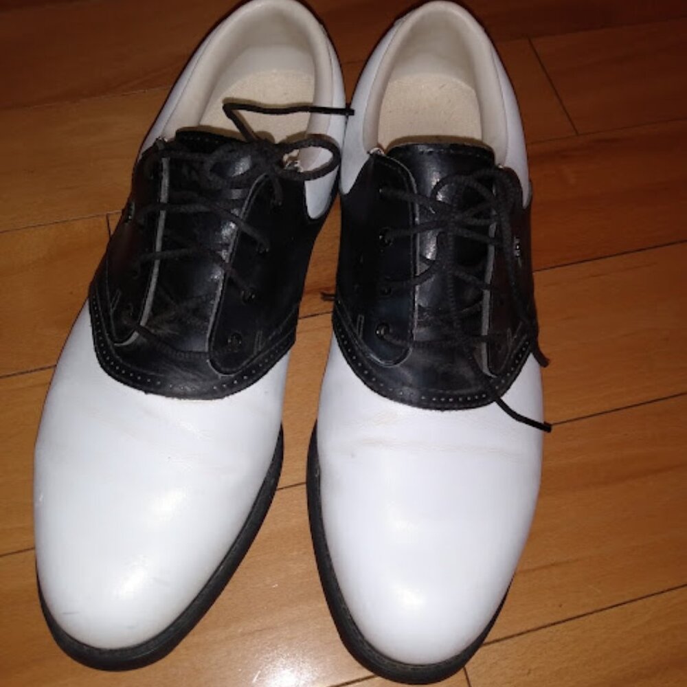 Lady Fairway golf shoes. Black and white. Size 10W.